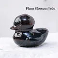 Small duck figurine hand-carved from natural Meihua Jade stone with polished finish - Plum Blossom Jade