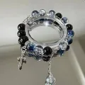 Elegant blue and black beaded bracelet with cross charm and silver chain detail - Black and Blue Ice Crack Cross Style (S436)