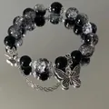 Handmade black and silver cracked glass beaded bracelet with butterfly charms - Black and Silver Cracked Bead Butterfly Style (S466)