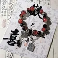 Red and black Chinese style beaded bracelet with butterfly charm and metal tag. - Red and Black Cracked Bead Butterfly with 'Bai Wu Jin Ji' (S569)