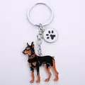 Hochwertiger Dobermann-Schlüsselanhänger aus Metall mit süßem Pfotenabdruck-Anhänger - Dobermann