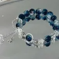 Elegant blue and clear crackle glass beaded bracelet with dangling silver star charms - Blue and White Cracked Bead Star Style (S633)