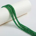 Detail view of shiny green faceted beads for DIY jewelry making accessories. - 4mm / Dark Green