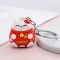 Llavero creativo 3D de gato de la suerte Maneki-neko en variante roja y blanca - Rojo