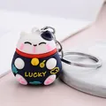 Llavero de gato de la suerte 3D en silicona azul marino y blanco estilo dibujos - Azul marino