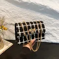 Classic black and white plaid chain shoulder bag with elegant gold hardware detail - Black Lattice