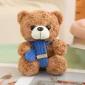 Zachte bruine pluche teddybeer met een blauwe gebreide sjaal en With Love-label - Lichtbruin / 20-30cm