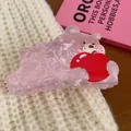 Cute pink acrylic hair claw clip with a cartoon bear and red apple graphic design - Pink Bear with Apple