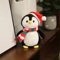 Morbido pinguino di peluche natalizio con cappello festivo e sciarpa - Pinguino di Natale / 20-30cm