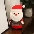 Pupazzo di peluche Babbo Natale con cartello Merry Christmas per decoro - Babbo Natale / 20-30cm