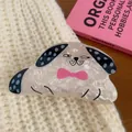 Cute cartoon dog acrylic hair claw clip with pink bow decoration on white knit fabric - Bowknot Spotted Ear Dog