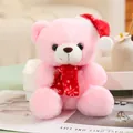 Peluche di orsetto rosa con cappello di Babbo Natale rosso e sciarpa con fiocchi di neve - Orsetto Rosa con Fiocchi di Neve / 20-30cm