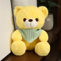 Morbido orsetto di peluche giallo con simpatica bandana a righe bianche e verdi. - Orsetto Giallo con Sciarpa / 20-30cm
