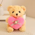 Morbido orsacchiotto di peluche con un cuore rosa e fiocco con rosa. - Orso Marrone Chiaro con Cuore / 20-30cm
