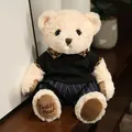 Simpatico orsetto di peluche beige che indossa polo nera e pantaloni a righe regalo - Orsetto Bianco in Abiti Neri / 20-30cm