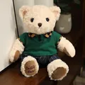 Morbido orsetto di peluche beige che indossa una polo verde e pantaloni a righe - Orsetto Bianco in Abiti Verdi / 20-30cm