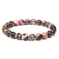 Natural rhodonite stone beaded bracelet with pink and black marbled pattern design. - Rhodonite with Black Lines