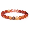 Natural carnelian agate beaded bracelet with orange and red banded stones - Banded Agate