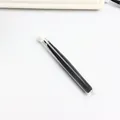 Professional precision black slanted eyebrow tweezers in a clear protective storage tube - 1.0mm Flat Tip in Tube / Black