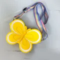 Vibrant yellow butterfly shaped silicone crossbody bag with adjustable rainbow strap - Butterfly Yellow