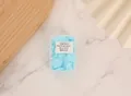 Portable blue petal-shaped soap paper flakes in a travel-friendly clear storage box - Blue Milk [Boxed]