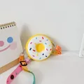 Cute donut-shaped silicone crossbody bag for girls with colorful sprinkles and printed strap - Donut Yellow