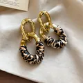 Vintage geometric leopard print leather earrings with high-end gold-tone finish - Retro Leopard Braided Loop Style / Gold & Coffee