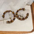 Elegant vintage leopard print leather hoop earrings featuring three cascading white pearls - Artificial Pearl Woven C-Shape Style / Silver