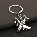 Llavero creativo de avión en aleación de zinc con acabado metálico plateado brillante - Plateado