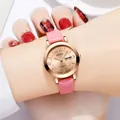 Elegant women's quartz watch with pink leather strap and rose gold case showing date - Leather Strap Gold Dial