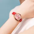 Stylish women's quartz watch featuring a pink sunray dial and a red leather strap - Leather Strap Pink Dial