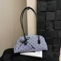 Stylish blue and white striped Boston bag with heart patterns and black bow detail - Black Heart