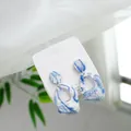 Artistic blue and white marble ceramic drop earrings with 925 silver pins on card - Hollow Geometric (1604-04)