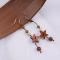 Handmade wooden star earrings with beads in a vintage bohemian style - 1140-04 Star