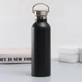 Black matte stainless steel insulated water bottle with handle and bamboo lid - Black