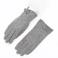 Elegante graue Wollhandschuhe für Damen mit zarter Schleife und weicher Strickstruktur. - Einheitsgröße / Grau (Kleine Schleife)