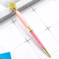 Elegant pink and gold metal crown ballpoint pen filled with sparkling pink crystals. - Pink with Gold Parts
