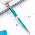 Elegant rose gold crown ballpoint pen featuring teal crystals and a sleek metal barrel - Peacock Blue (Rose Gold Accents)