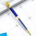 Elegant golden crown metal ballpoint pen featuring royal blue crystal filled barrel design - Transparent Blue (Gold Accents)