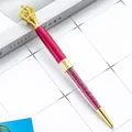 Elegant magenta crystal ballpoint pen featuring a decorative gold crown topper and sparkling pink stones - Dark Rose Red