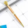 Elegant gold crown ballpoint pen with sparkling gold crystals in the barrel - Champagne Gold