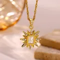 Close-up of 18K gold plated sun starburst pendant necklace with micro-pave crystals - Rectangular Main Stone Starburst (G4218045)