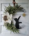 Detailed view of moon-shaped Christmas wreath with white flower and black cat silhouette - Crescent Cat Silhouette Style (40CM) (Picture 4-40CM)