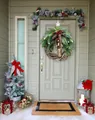 Festive Christmas wreath with pine cones, red berries, and bells hanging on a door - Christmas Pine Needle Red Berry Bell Style (45CM)(Picture 62-45CN)