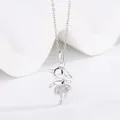 Close-up detail of a cute cartoon girl pendant necklace with sparkling micro-pave stones - Dancing Girl Style (11)