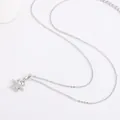 Detailed view of titanium steel necklace featuring a sparkling angel character pendant - Angel Boy Style (09)