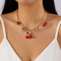 Sweet gold chain necklace featuring red cherry and strawberry charms on a model. - Cherry Strawberry Heart Pendant (6131032174376) / US Size 6