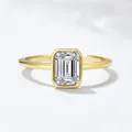 Minimalist S925 silver ring with emerald cut clear zircon in a gold bezel setting - US 5 / Gold