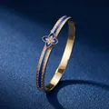 Luxury gold-plated stainless steel bangle featuring blue enamel and sparkling clover diamond accent - Dark Blue Four Leaf Clover (40甲-B-6)