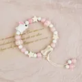 Handmade pink ceramic beaded bracelet featuring a cute rabbit, stars and bone charm - Star-Gazing Rabbit Style (1772-06) / Pink White